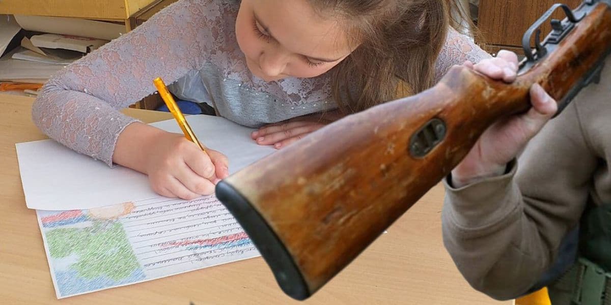 дитина пише