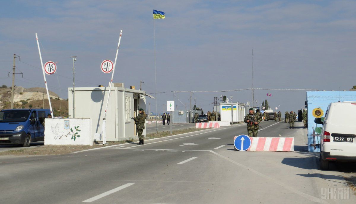 В ООС пояснили куда следует звонить в случае вымогательства на пунктах пропуска на Донбассе