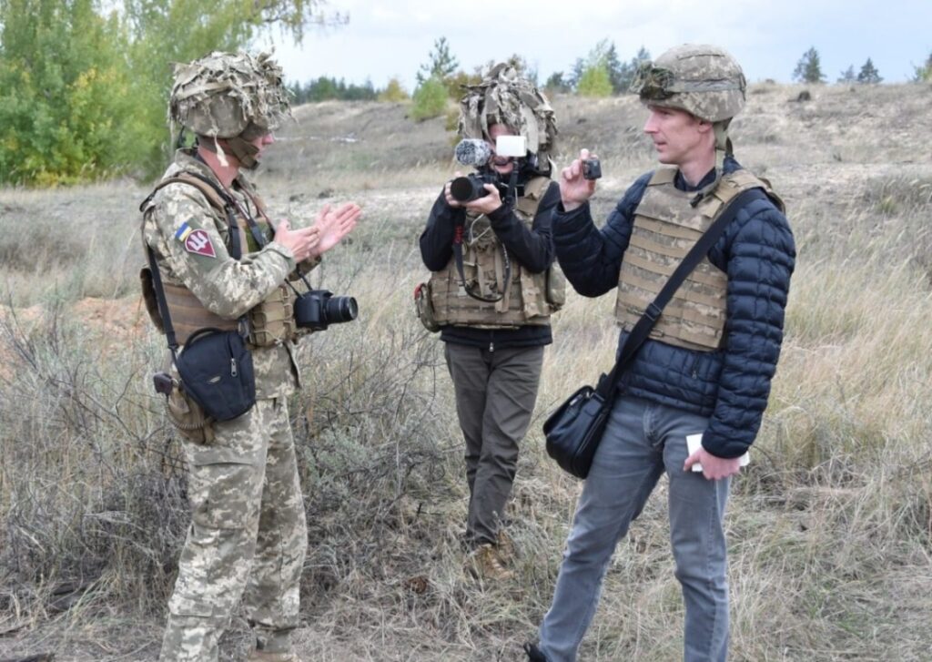 американский журанлист в ООС