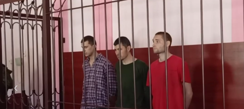 В Мариуполе оккупанты "осудили" на 18 и 20 лет трех бойцов полка "Азов"